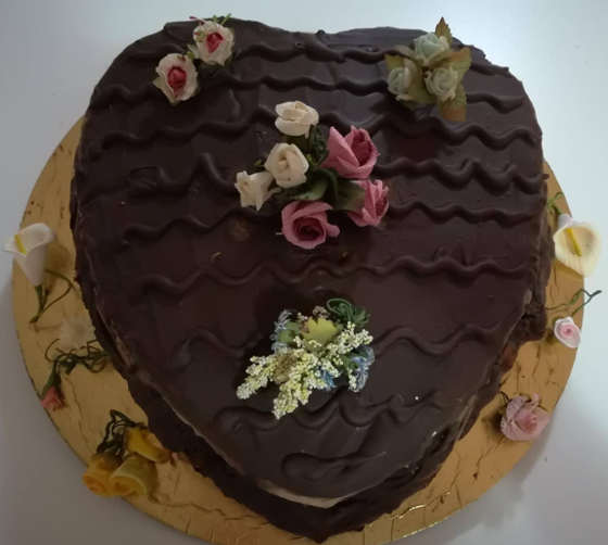 Ingredienti Torta cioccolato e arancio a forma di cuore una torta San Valentino