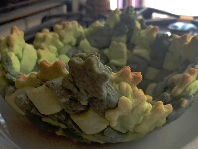 Cestino di frolla salata intrecciato con verdure gratinate